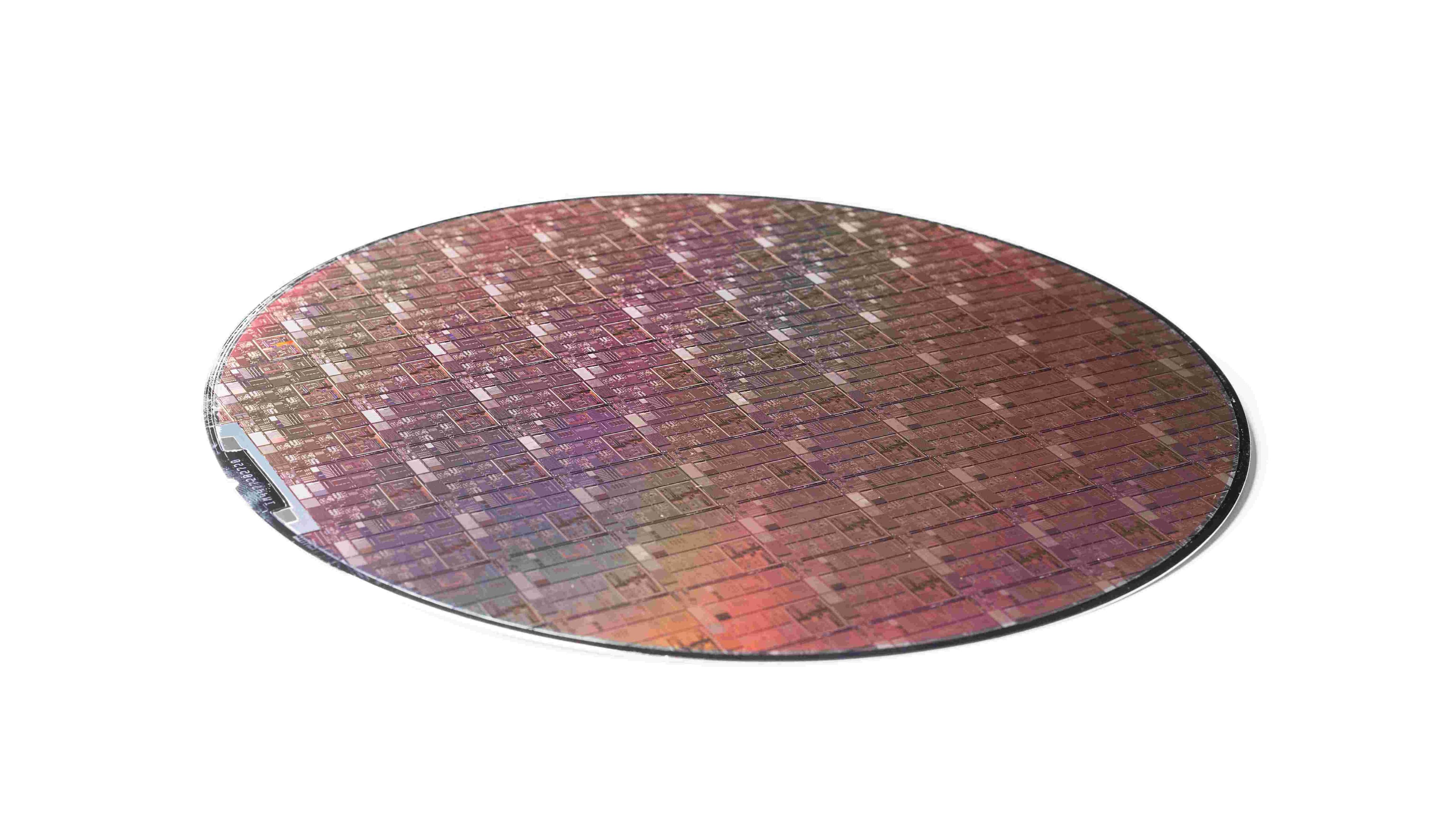Photonic%20IC%20manufacturing Photonic IC wafer with a grid of chip dies