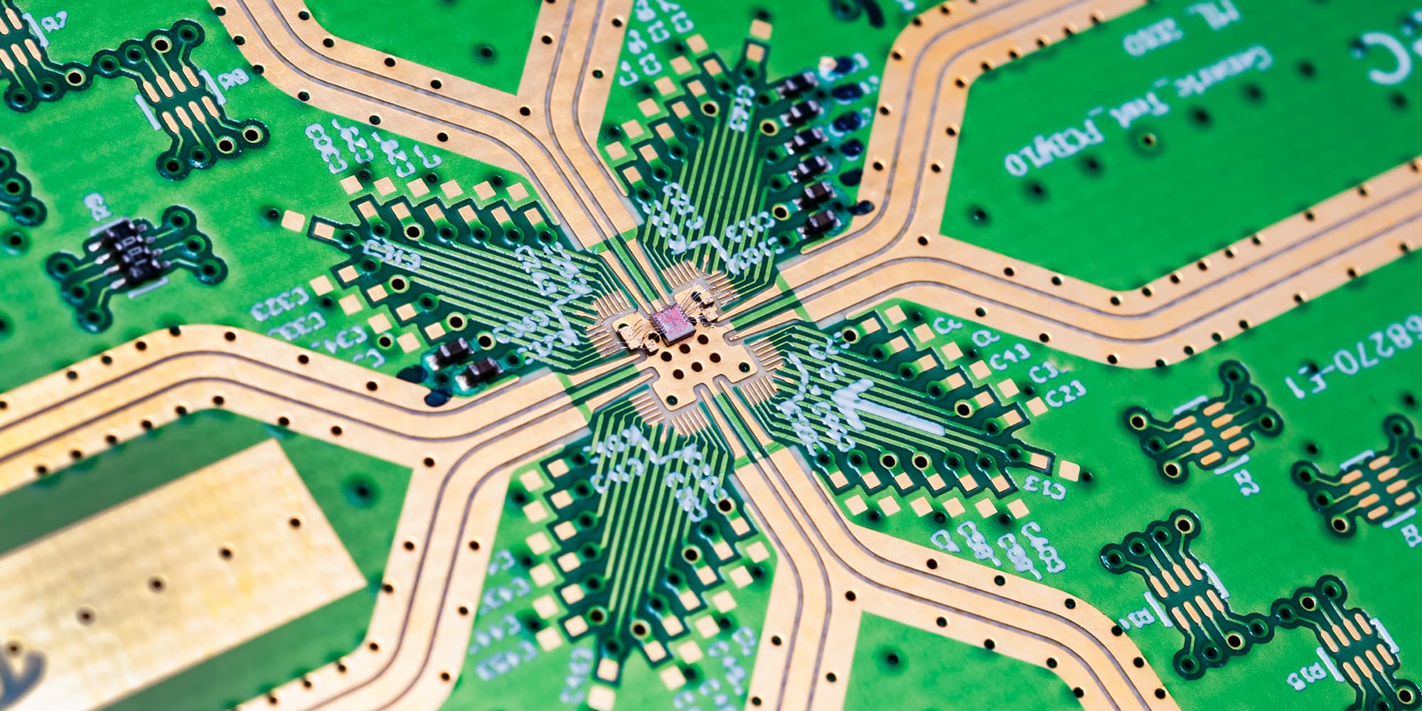 15-radar_1 Close-up of a green circuit board with copper traces and a central sensor chip layout
