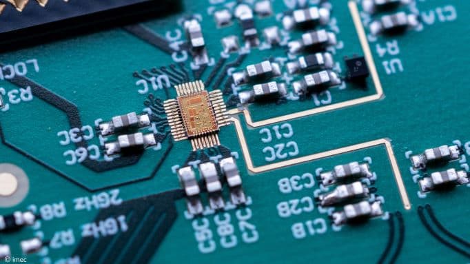 Close-up of circuit board with central chip and components Close-up of a circuit board with a central chip and surrounding surface-mounted components
