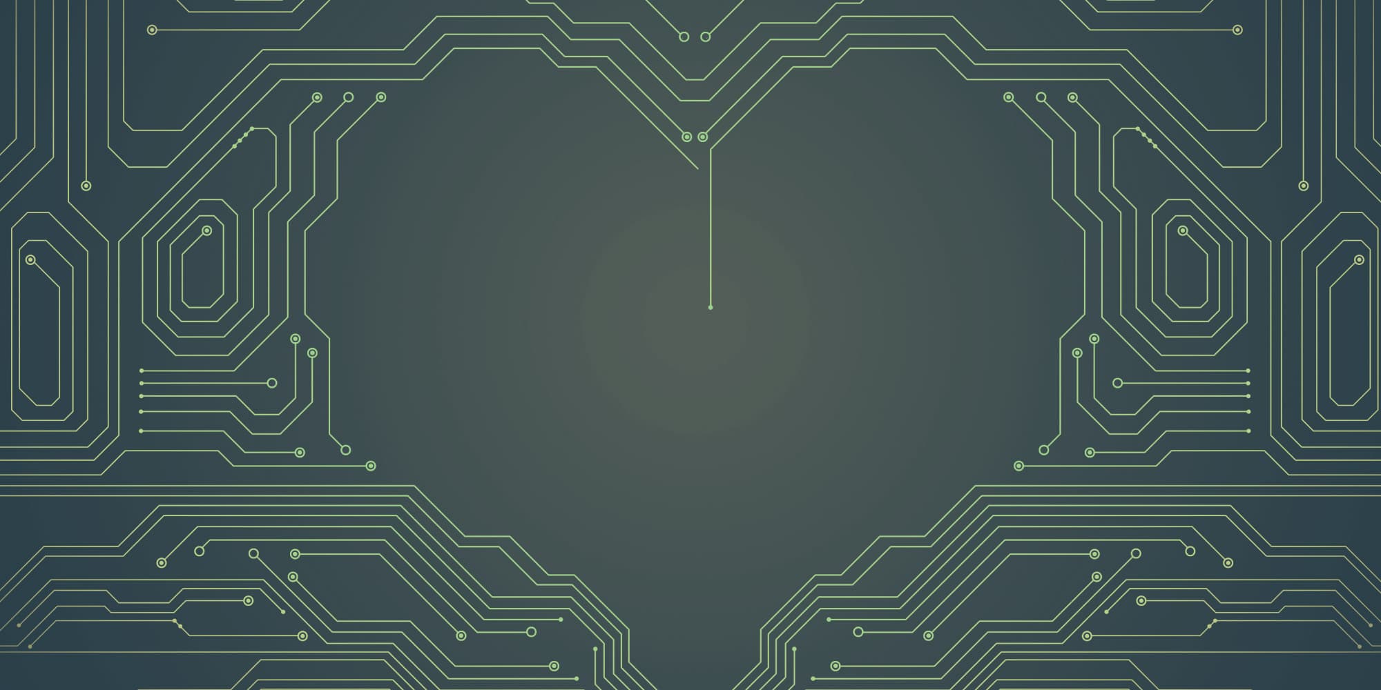 4.-Heart-on-chip_1 Stylized heart outline formed by green circuit traces on a dark background