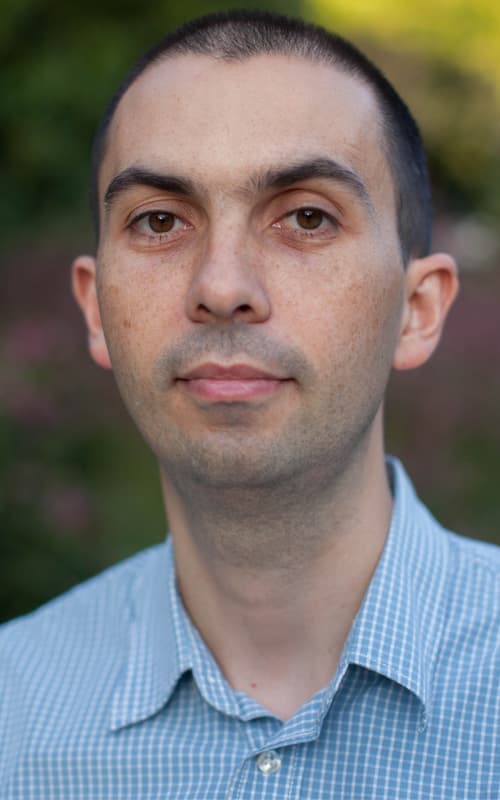 Alex Portrait of Alexandru Andrei in a blue checkered shirt