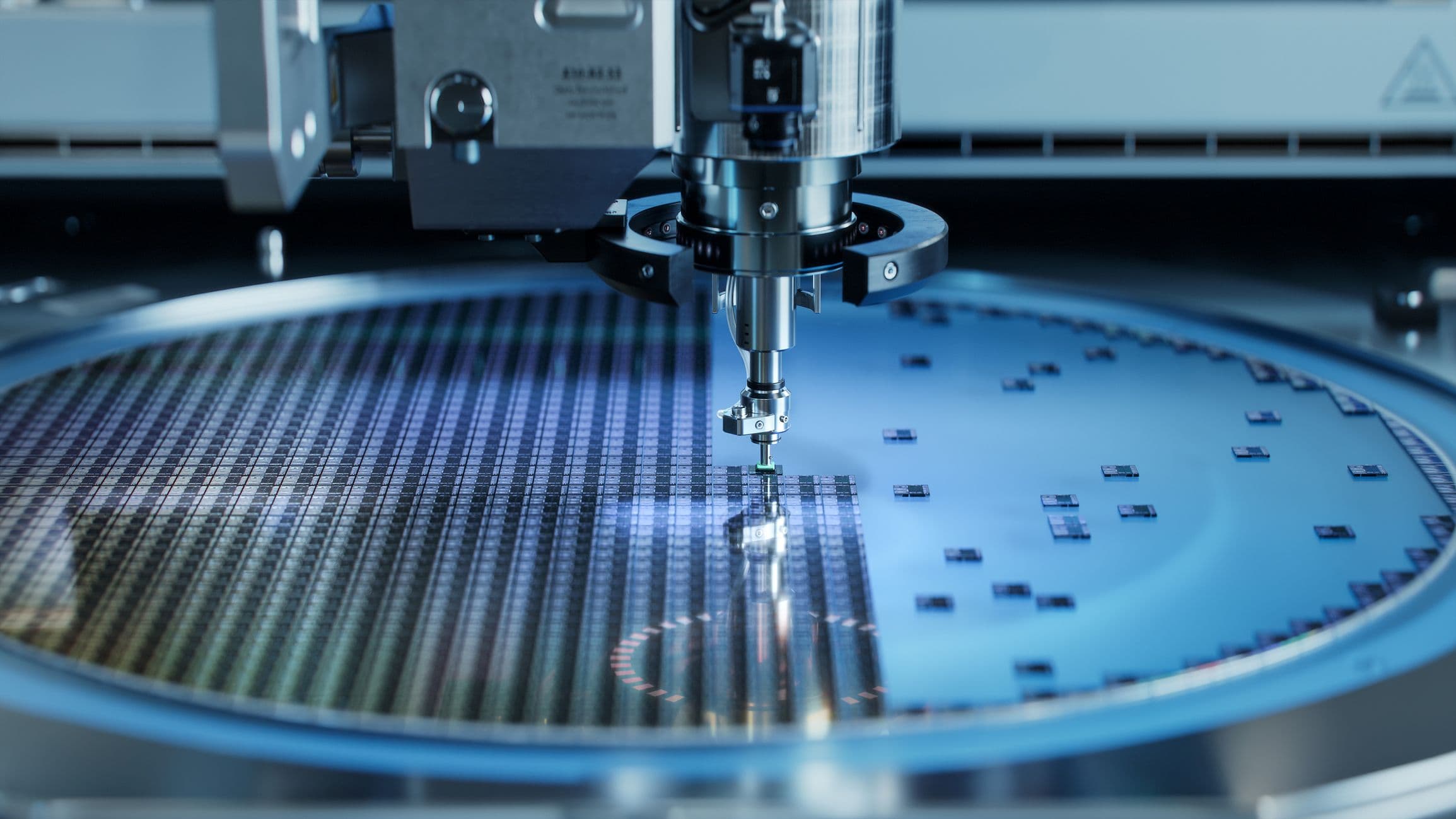 ASIC%20services Automated semiconductor machine handling a silicon wafer with many chip dies