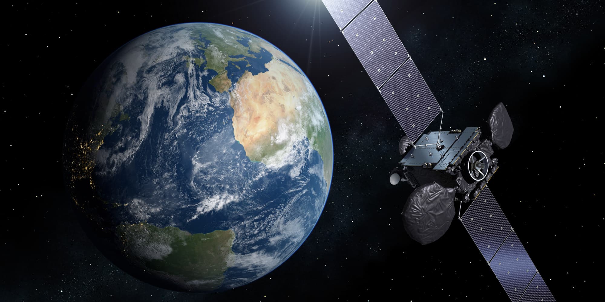 ASICs-continue-their-starring-role-in-the-New-Space-era Satellite with extended solar panels orbiting Earth in space