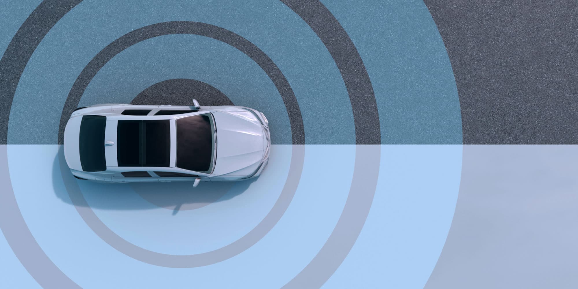 automotive2 Top-down view of a car surrounded by concentric sensor rings on a split gray and blue surface