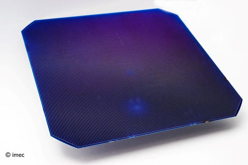 Bifacial%20PV Blue bifacial solar cell wafer on a white background
