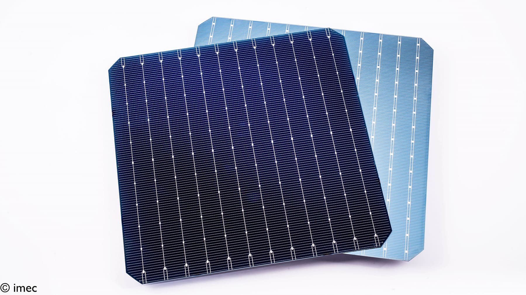 bifacialsolar001_header_3 Three overlapping bifacial solar cells in dark blue and light blue on a white background