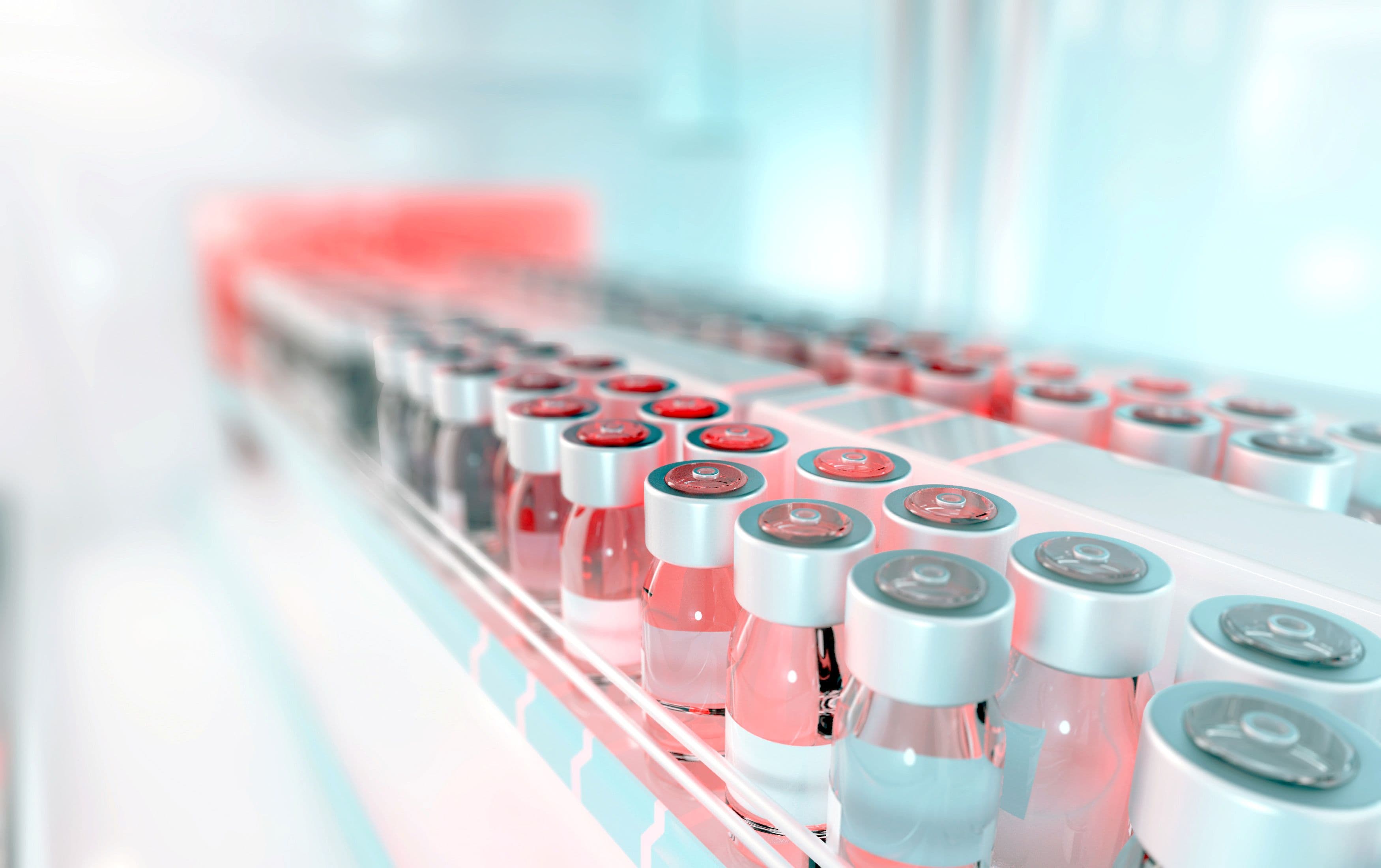 Biomanufacturing Row of vials moving along a biomanufacturing conveyor in a bright lab setting