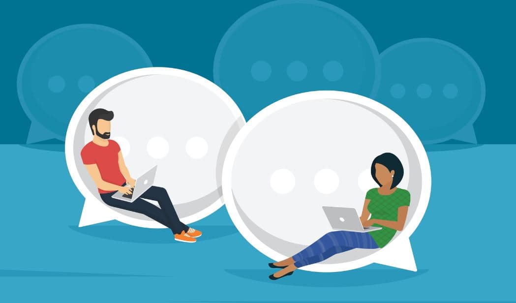 Two people using laptops in oversized chat bubbles Two people using laptops inside oversized chat bubbles, with faint bubbles in the background.