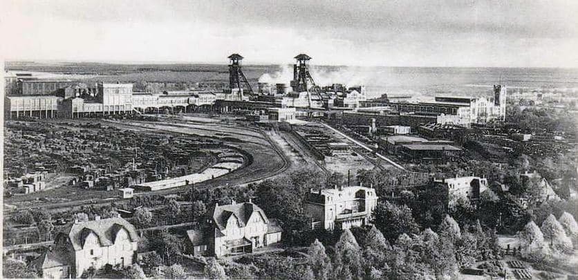 Historic view of Waterschei-Genk mine site Historic view of the Waterschei-Genk mine site with headframes, industrial buildings and tracks