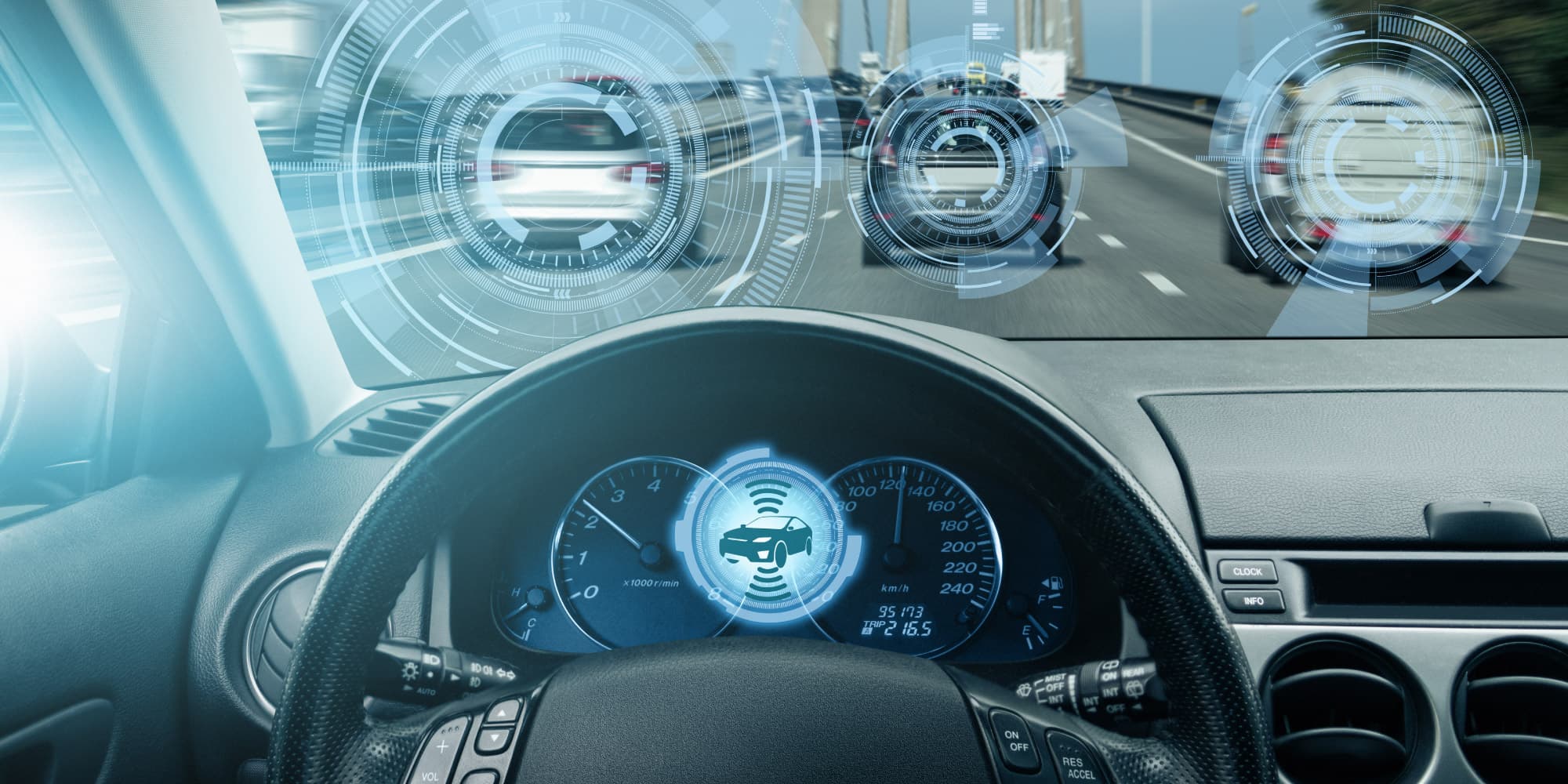 Connected-car-technology Car interior with a digital windshield display showing connected vehicles on the road