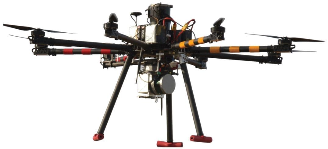 Drone_0 Drone-mounted LiBorg mapping system with multiple rotors, sensors, and landing legs on a white background