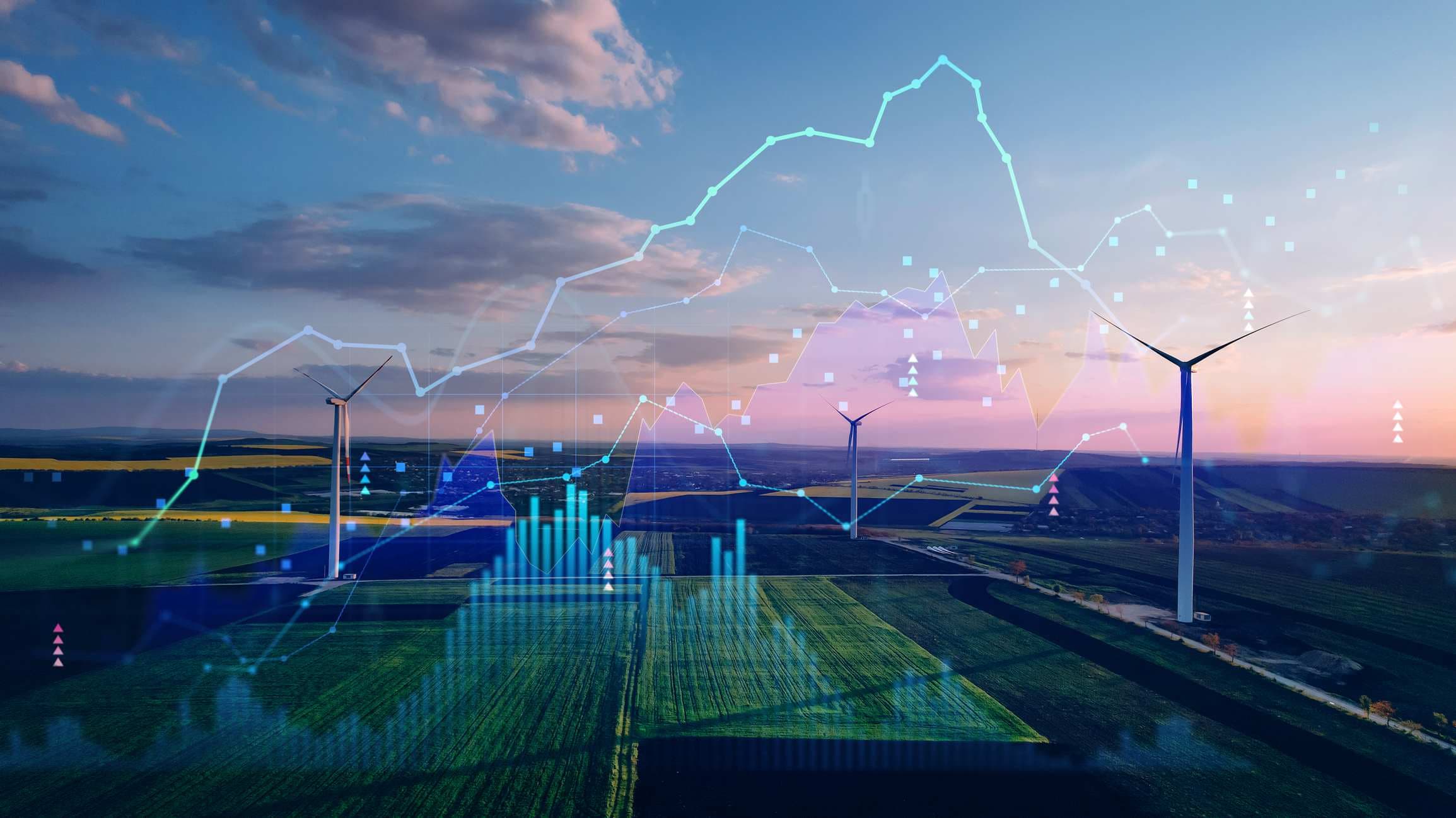 Energy%20digitalisation Wind turbines over farmland with digital data graphs overlayed at sunset
