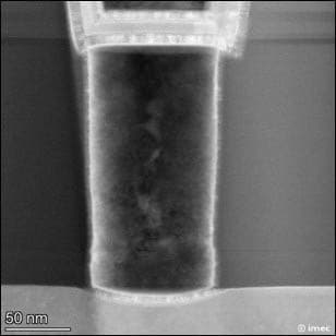 Cross-sectional micrograph of nanoscale device pillar Cross-sectional micrograph of a nanoscale device pillar on a substrate, with a 50 nm scale bar.