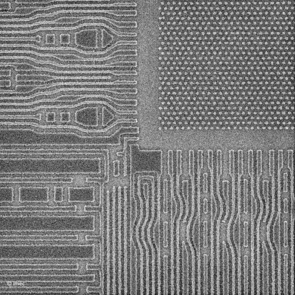 DRAM and logic test structures on chip wafer Grayscale semiconductor pattern showing dense DRAM and logic test structures on a chip wafer