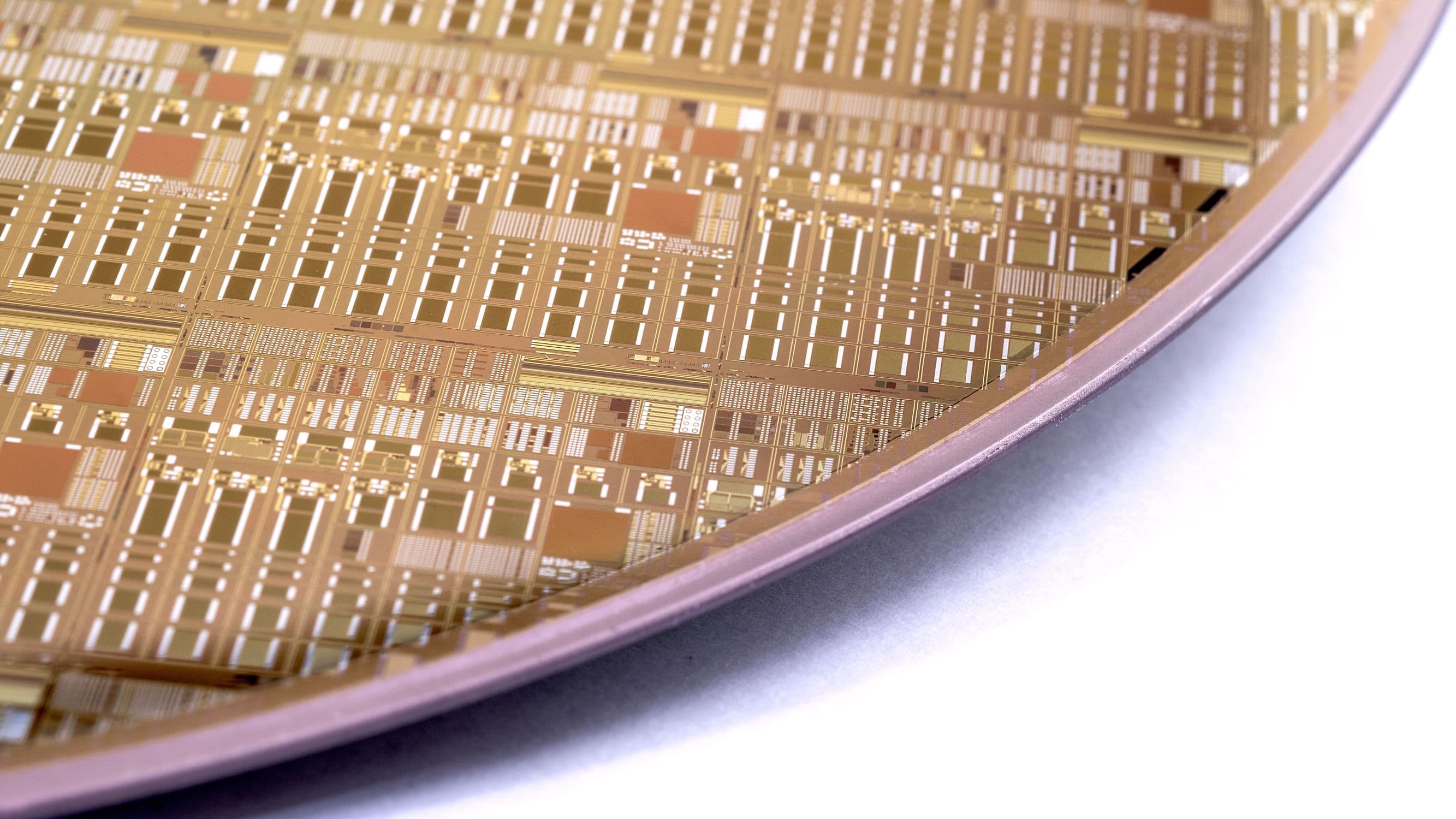 Figure_1_-_Poly-AlN_0 Close-up of a semiconductor wafer with patterned GaN power components
