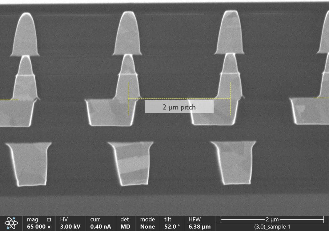 Figure%201%20-%20D2W%20hybrid%20bonding%20with%202%C2%B5m%20pitch Cross-section TEM of die-to-wafer hybrid bonding with 2 µm pitch interconnects.