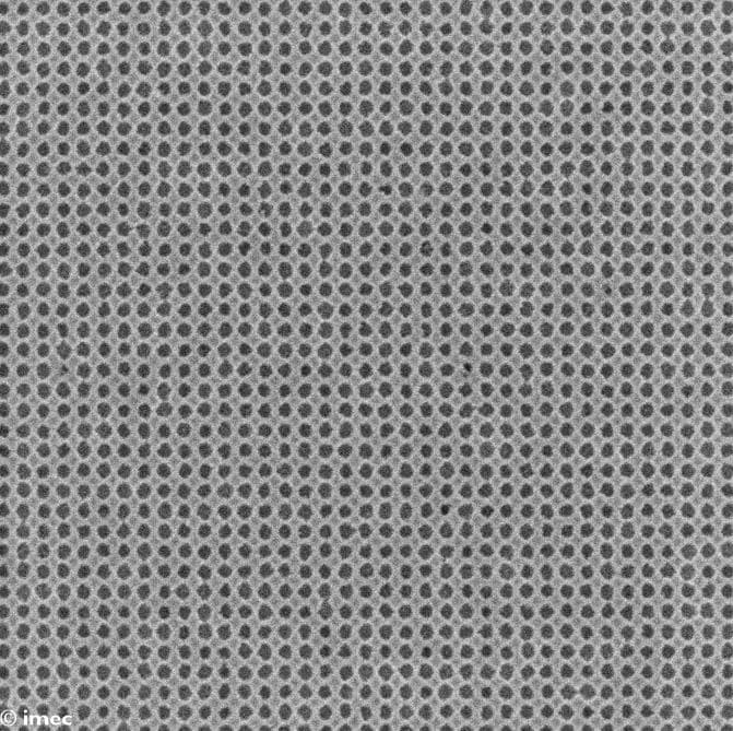 Dense array of 28nm pitch contact holes in semiconductor layer Dense array of 28nm pitch contact holes patterned in a semiconductor layer