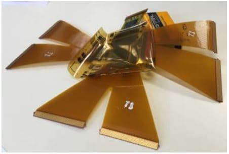 Figure%203%20-%20Fingerprint%20sensor Delaminated fingerprint sensor on flexible amber film with a central damaged chip area