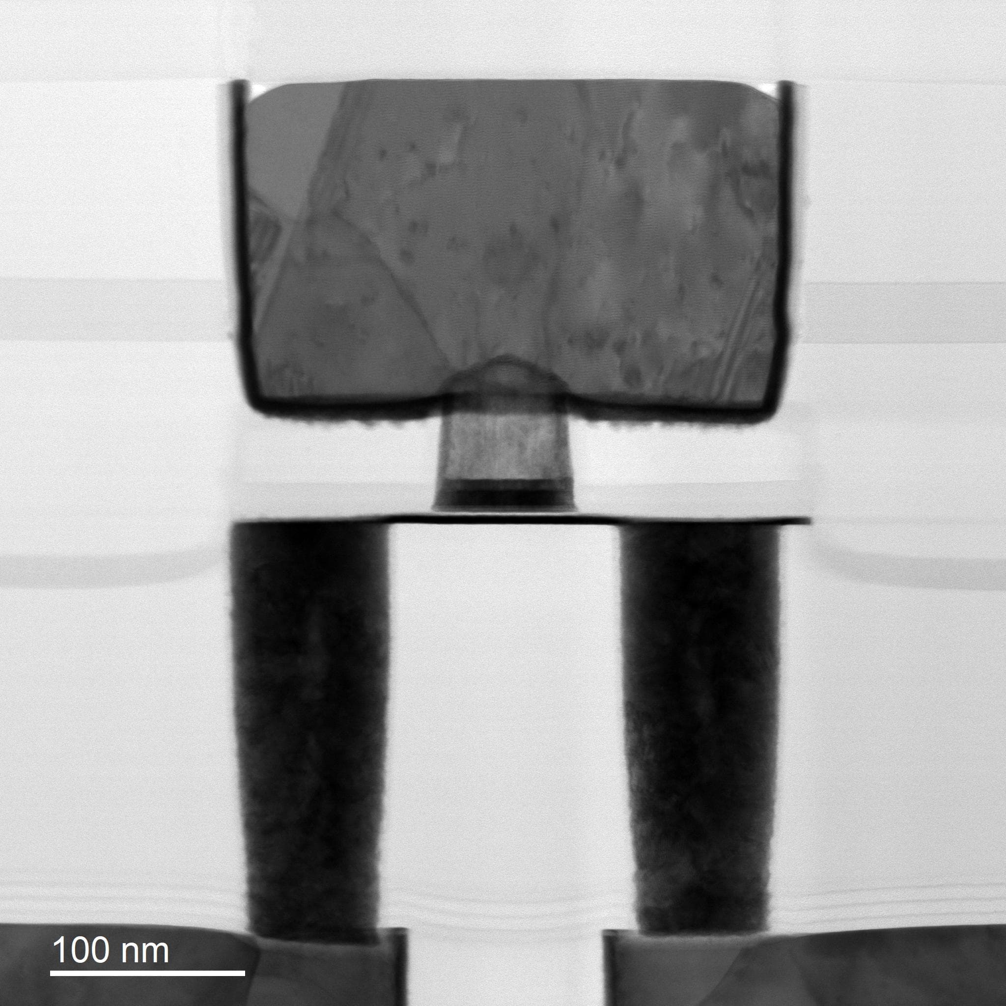Figure%203%20-%20TEM%20of%20an%20SOT-MRAM%20device%20with%20SAF%20free%20layer TEM cross-section of an SOT-MRAM device with a central pillar between two electrodes