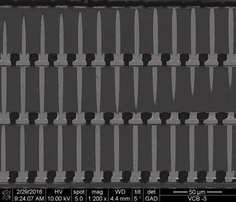 Figure_4_-_3D_die_stack_afgeknipt_bovenaan_0 Microscope cross-section of a four-die stack connected by vertical TSVs and microbumps.