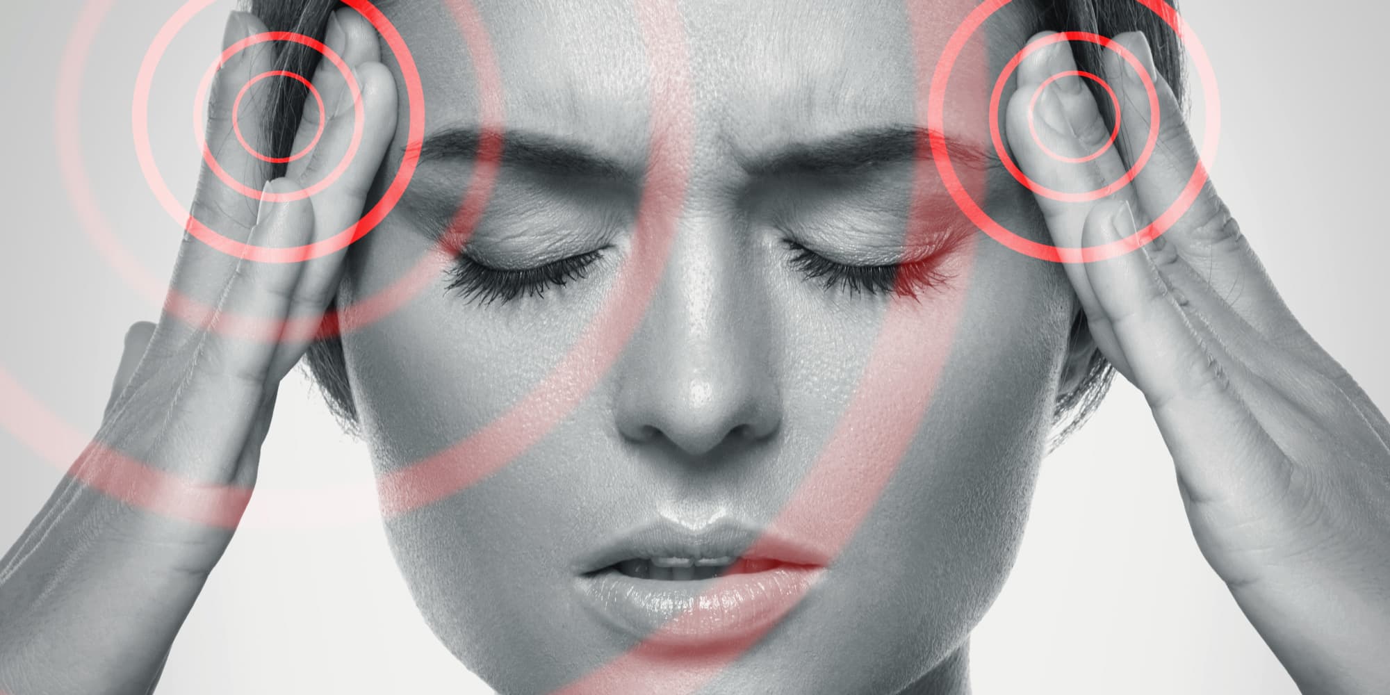 From-last-option-to-better-option_0 Close-up of a woman pressing her temples with red concentric circles overlaid on her head