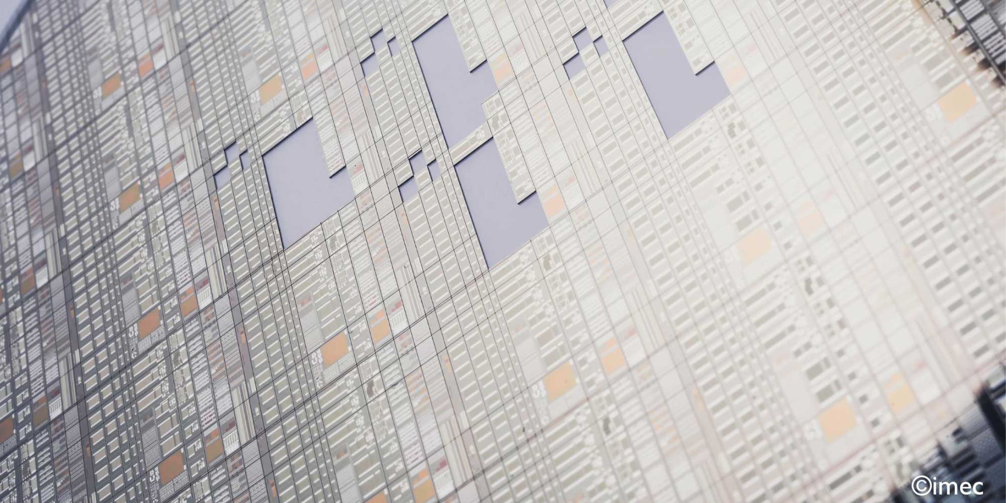 GaN Abstract close-up of a semiconductor wafer pattern with a visible imec watermark
