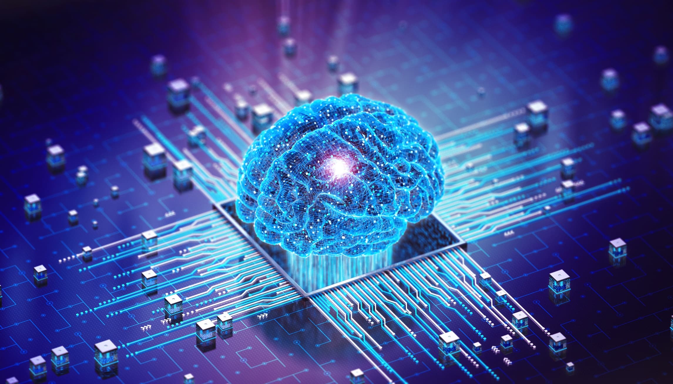 GettyImages-1495819409 Glowing digital brain connected to a circuit board with chip-like components