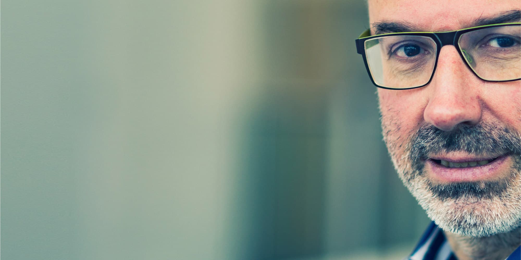 guido Close-up portrait of Guido Groeseneken wearing glasses