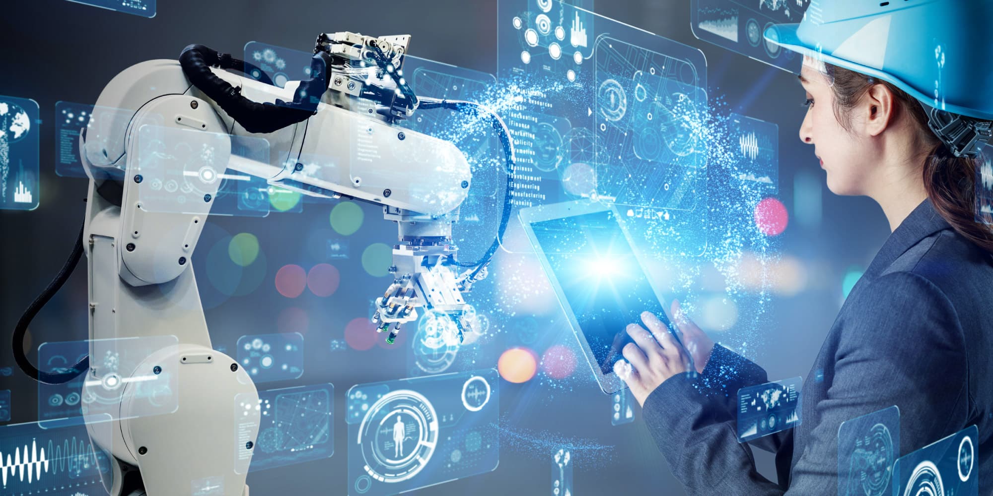 HaLow-header Industrial robot arm and engineer using a tablet with digital network overlays