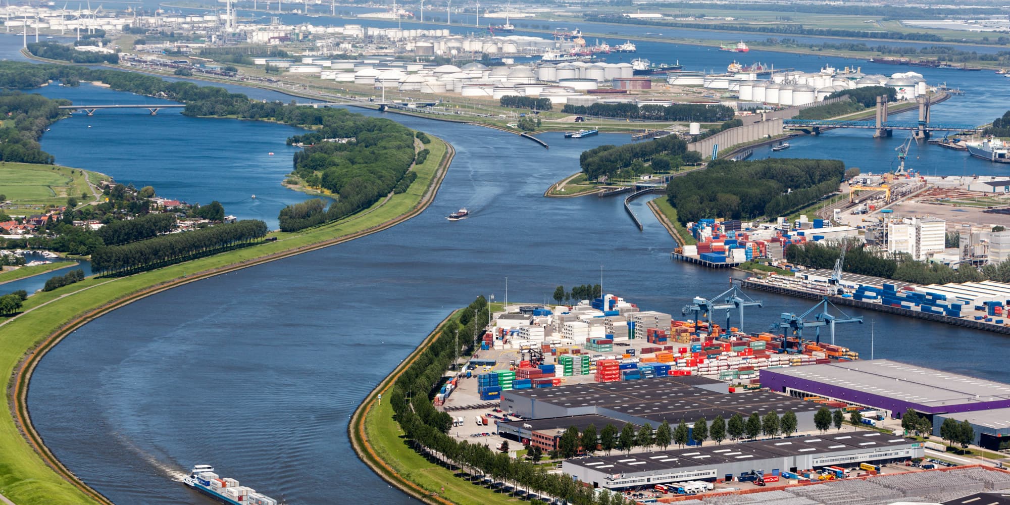 haven-rotterdam Aerial view of the Rotterdam port with waterways, container terminals, tanks and industrial facilities