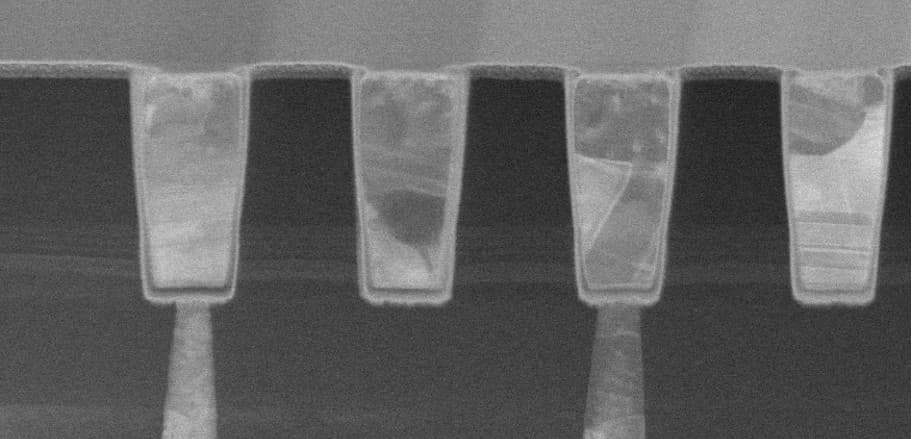 Header%20suggestion Cross-section of wafer interconnects linking the front and backside