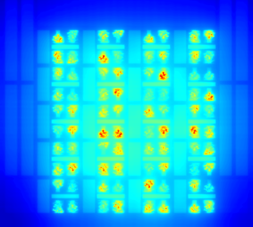 header_T_multiscale_80powermaps_range60_97 Thermal heat map of a chip array, with hot spots highlighted in red and yellow