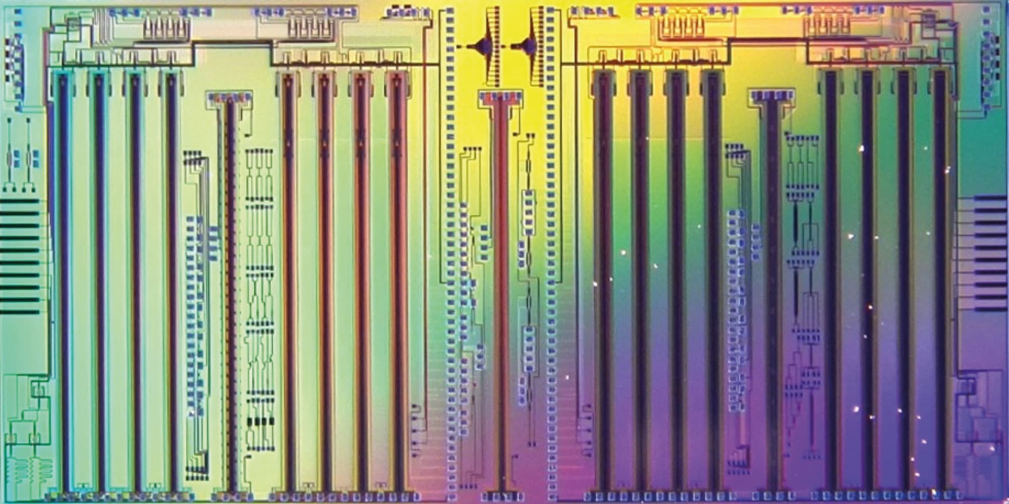 heterogenous-integration Colorful close-up of a semiconductor chip layout with long parallel circuit lines