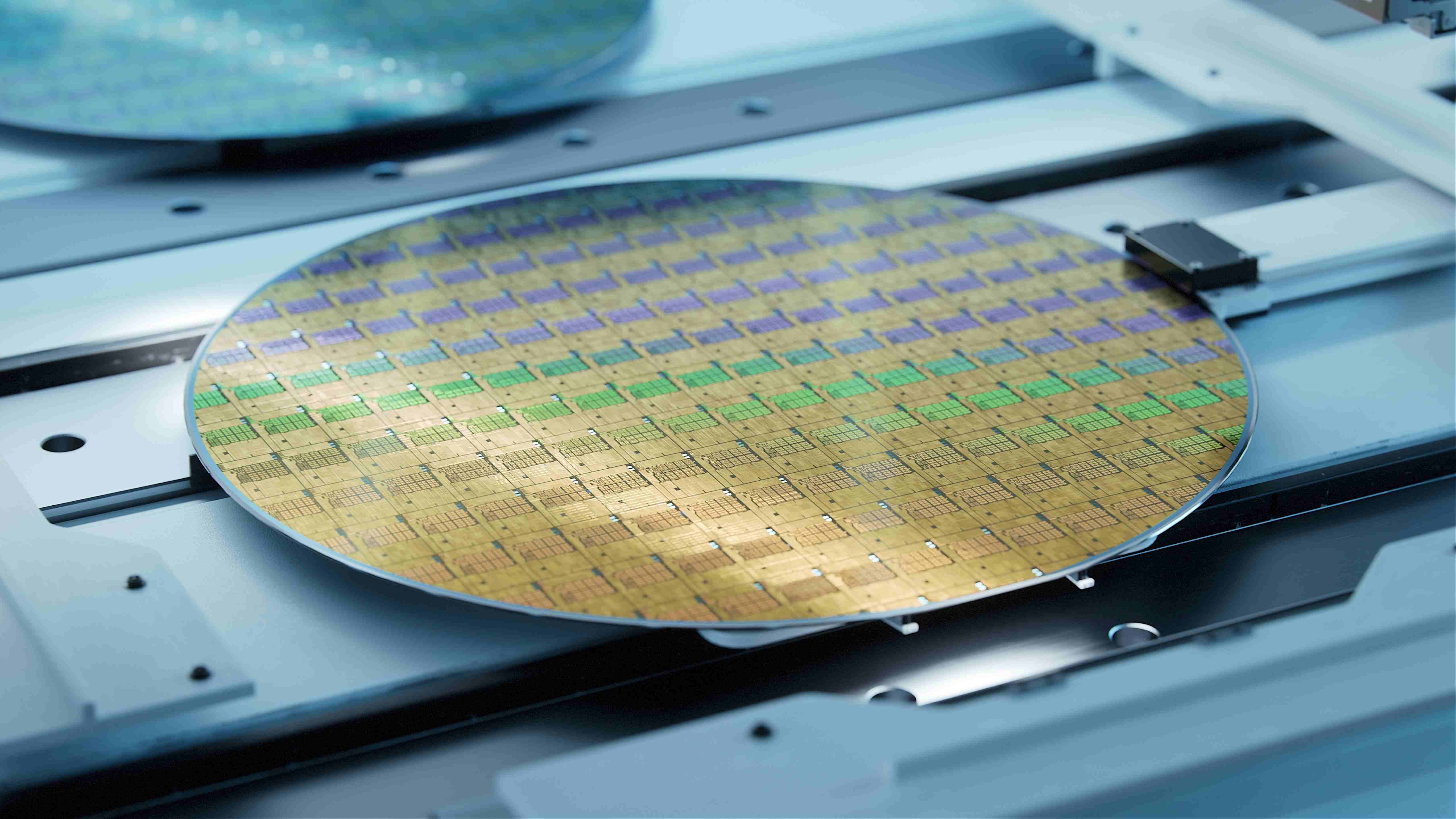 IC-Link%20by%20imec Silicon wafer with patterned chip dies in a semiconductor tool