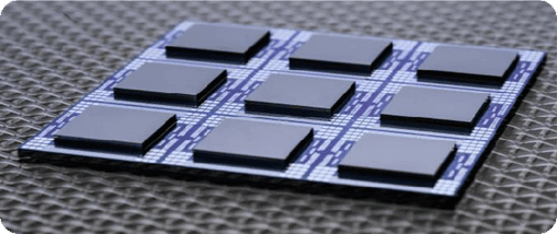 image Semiconductor wafer with nine square chip dies on a patterned substrate