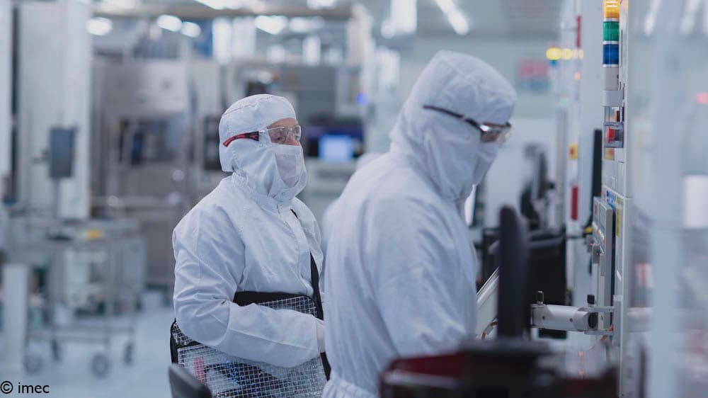 imec%20300mm%20cleanroom Two researchers in white cleanroom suits working in imec’s 300mm cleanroom