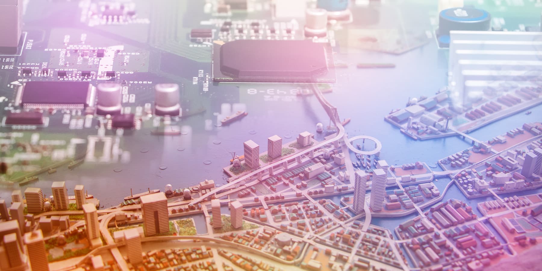 imec-magazine-11-smart-space_1 Circuit board overlaid with a miniature smart city model in pastel light