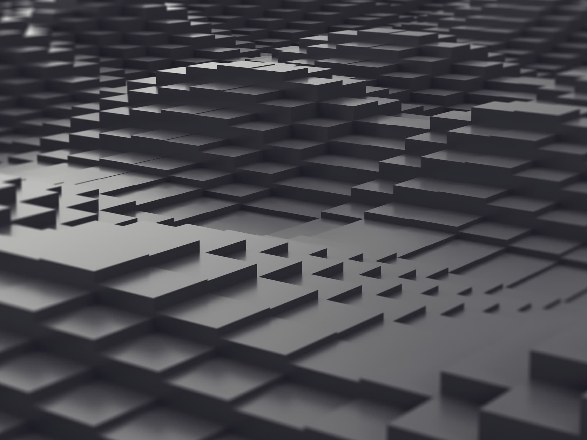 imec-magazine-vertical-nanowire-stack_1 Abstract dark gray stacked geometric blocks suggesting a dense chip architecture