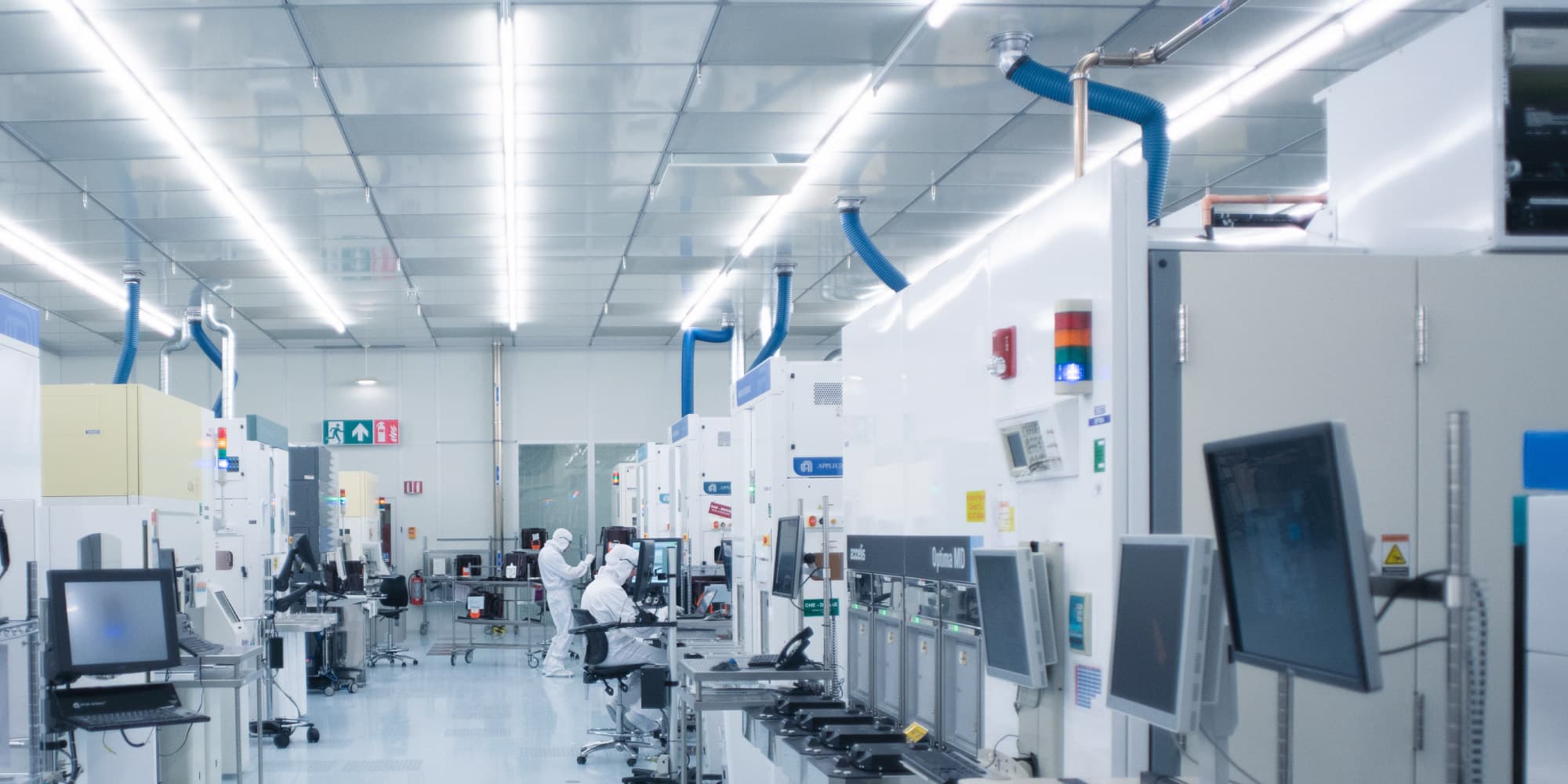 Imec-presents-alternative-metals-in-advanced-interconnect-and-contact-schemes-as-a-path-to-2nm-technology-nodes Cleanroom with researchers operating semiconductor equipment