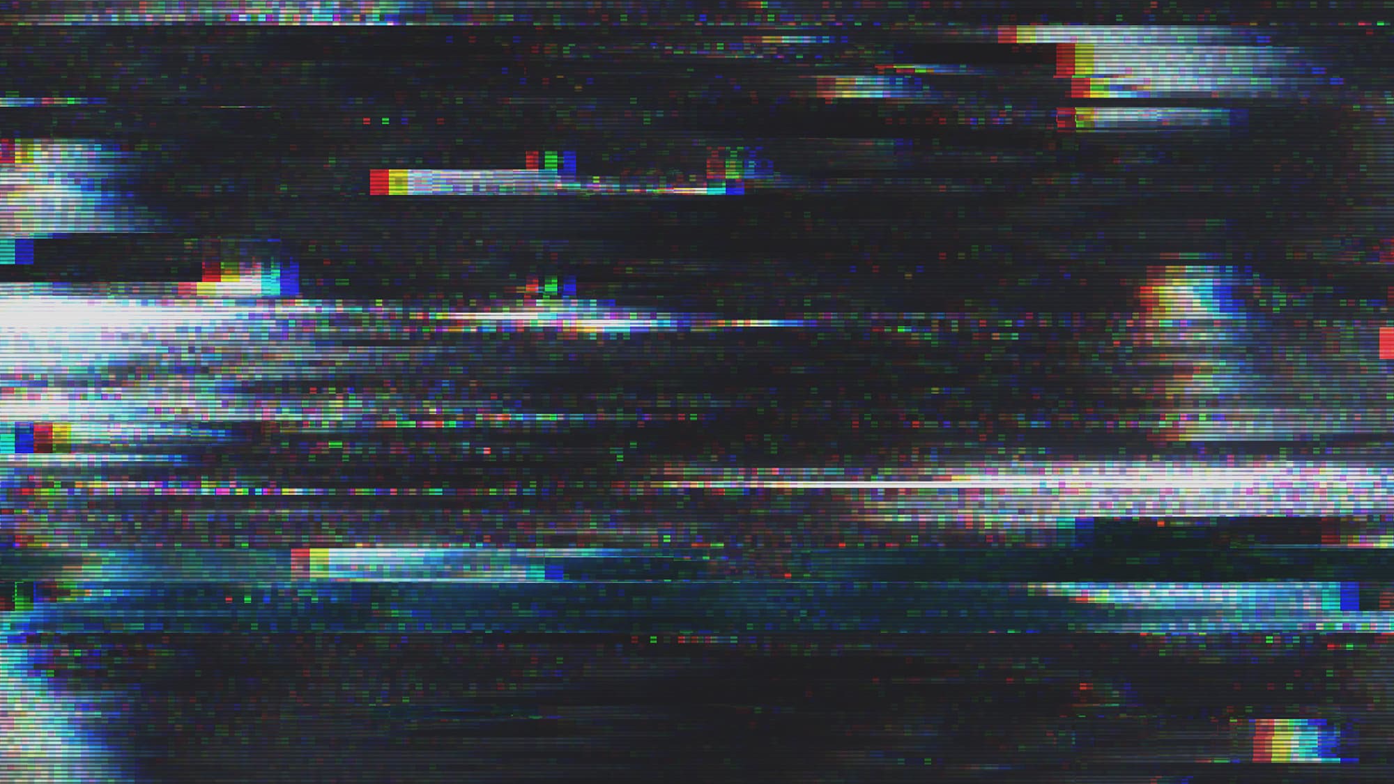 iStock-890862784_1 Abstract glitchy video scanlines with bright color streaks on a dark background, suggesting SDR to HDR conversion