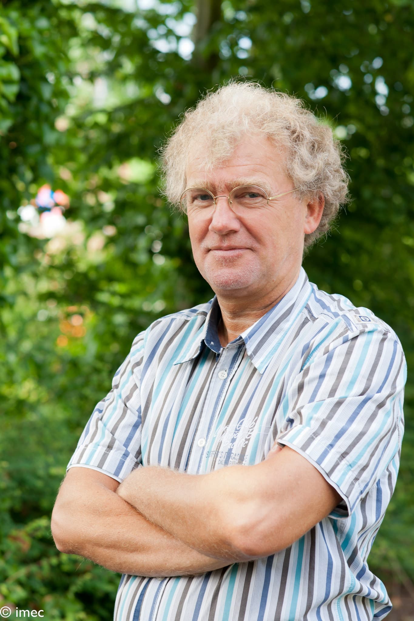 jan_van_houdt_1 Portrait of Jan Van Houdt standing outdoors with arms crossed
