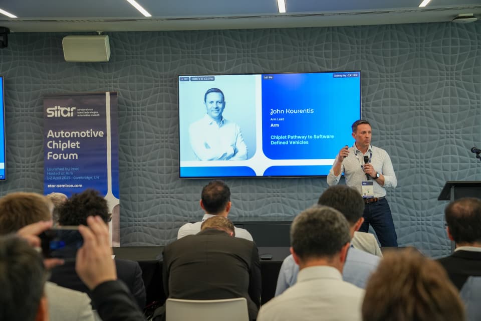 john-kourentis-presenting Speaker presenting on chiplet pathway to software-defined vehicles at the Automotive Chiplet Forum