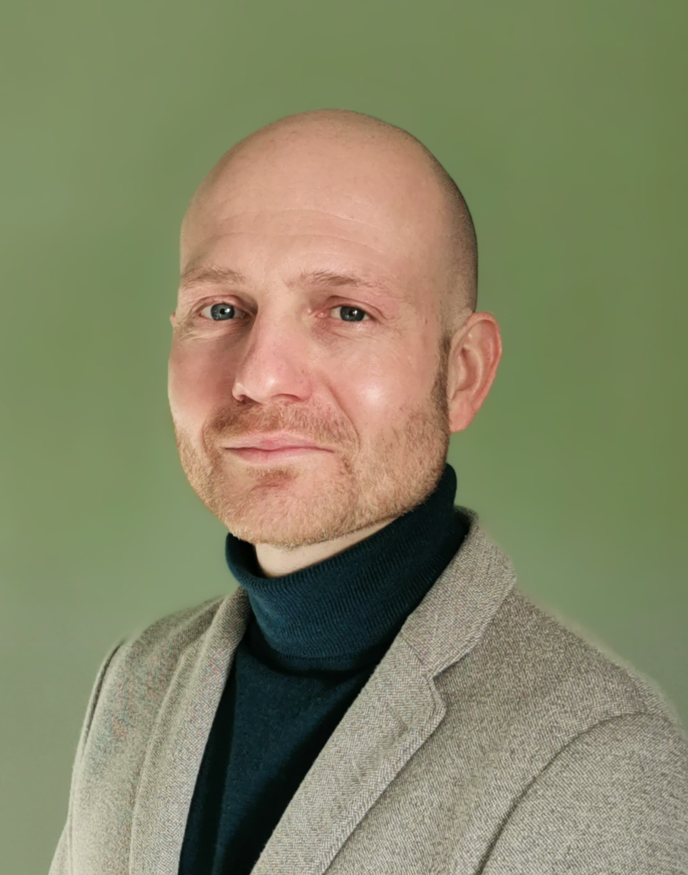 Joris%20Van%20Driessche Portrait of Joris Van Driessche against a plain green background