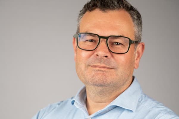 Kris%20Gevaert Kris Gevaert, Associate Director of the VIB Department of Medical Protein Research, wearing glasses and a light blue shirt