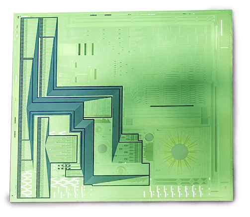 Lens-free%20fluorescence%20microscopy%20chip Green semiconductor chip with patterned sensor structures and blue L-shaped traces
