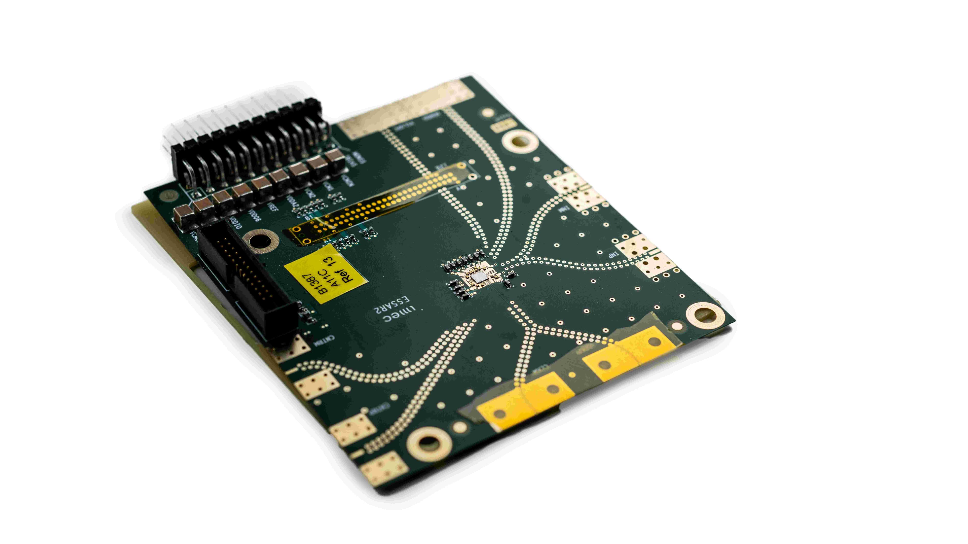 Low-power%20ADC Prototype ADC circuit board with connectors and a small chip on a green PCB