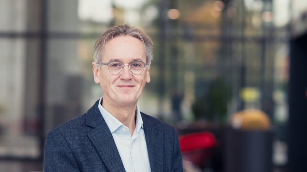 Mario-Huyge Portrait of Mario Huyghe, senior venture development manager, in a blazer and glasses