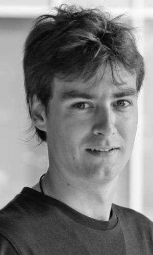 matthias_strobbe_1 Portrait of Matthias Strobbe, a researcher and IoT business developer, in black and white.