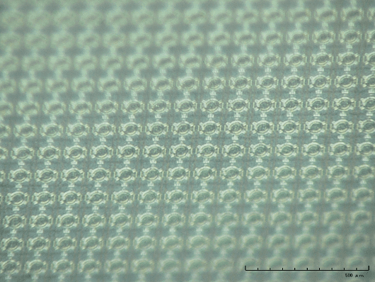MEMS-based%20ultrasound%20transducers Microscope view of a MEMS ultrasound transducer array with repeating circular elements