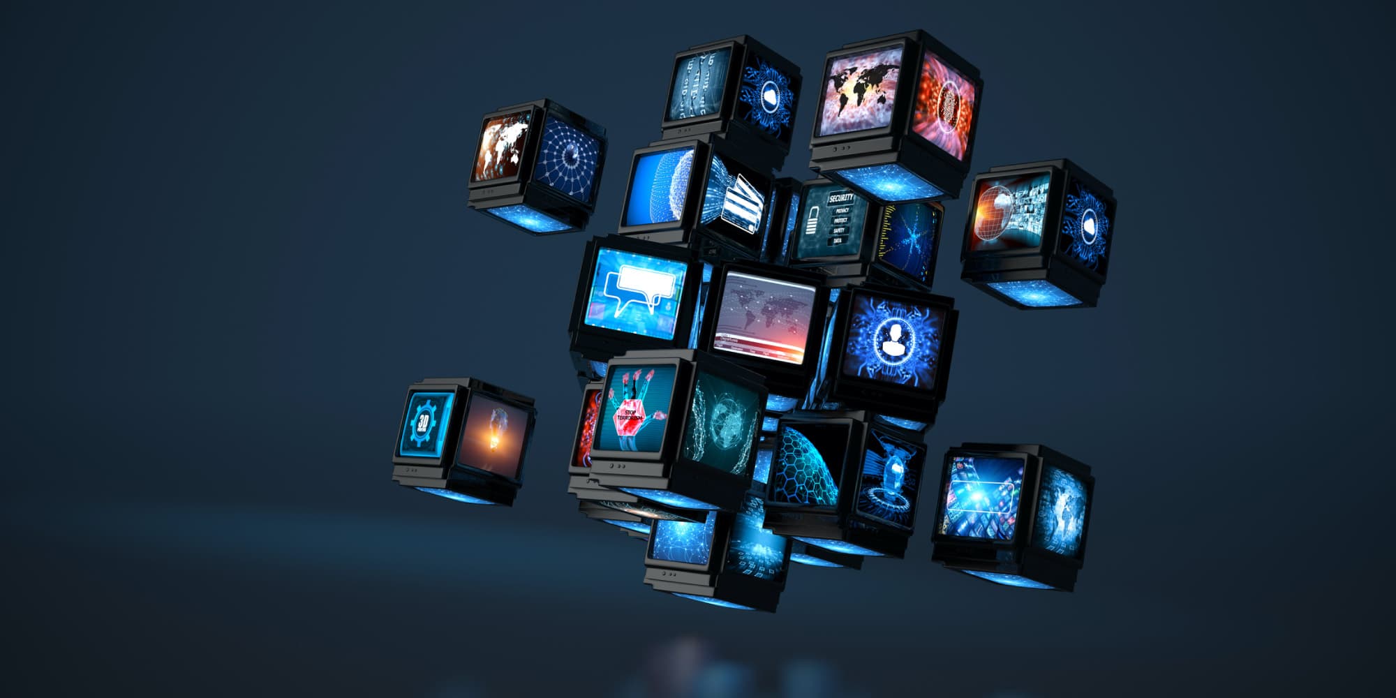 multimedia Cluster of floating OLED display cubes showing blue digital interface graphics on a dark background
